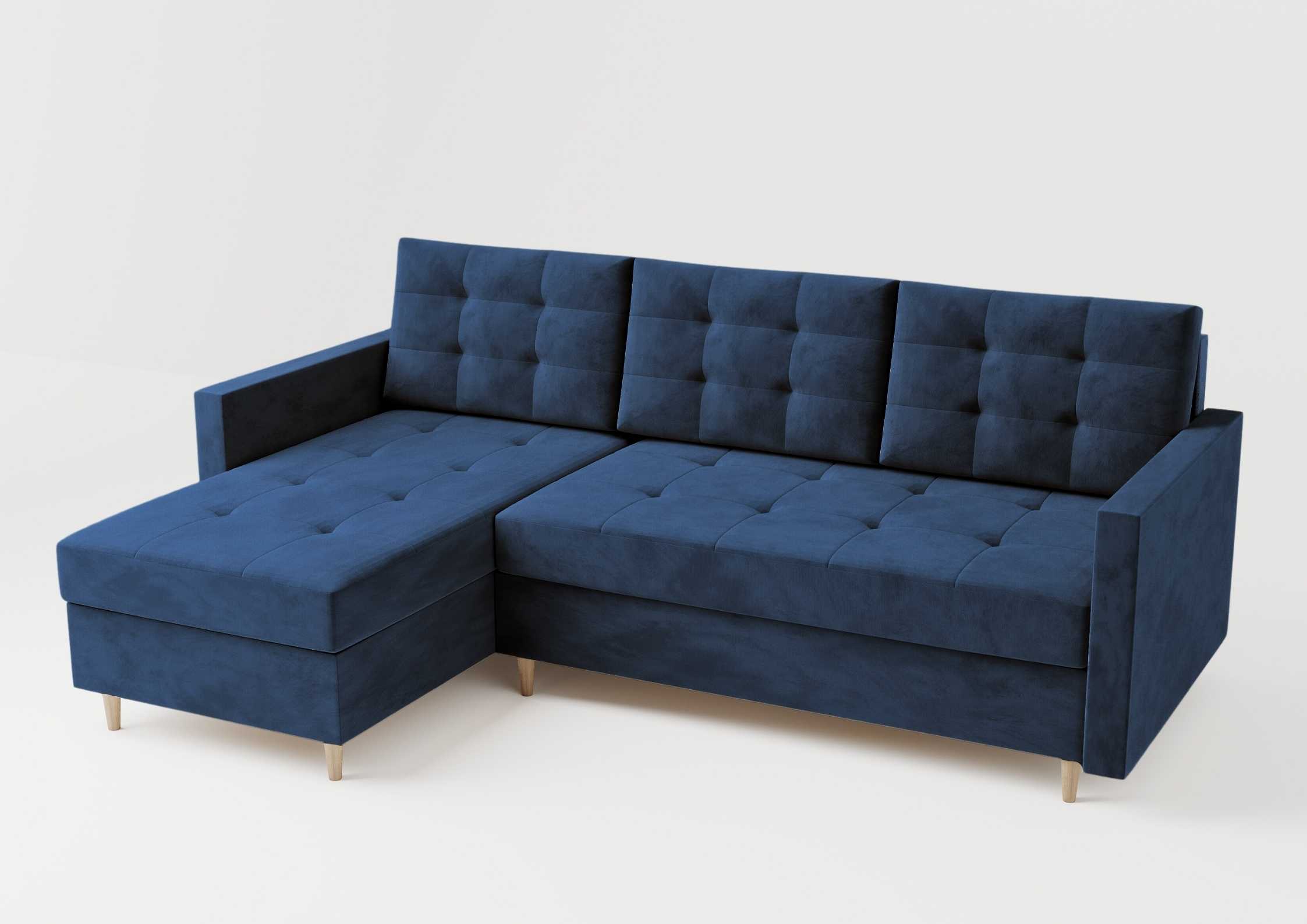 Skandynawski narożnik na drewnianych nogach rozkładany. Pikowana rogówka w kolorze granatowym